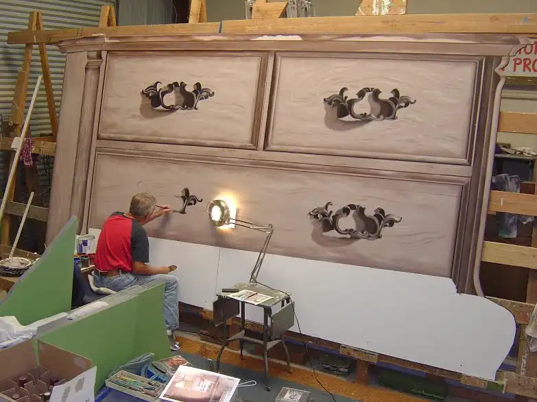 Cerney at work on a large mural